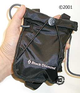 Black Diamond Space Shot Headlamp, view of battery bag in hand