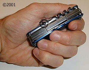 leatherman juice cs4 glacier - in hand; closed; side view