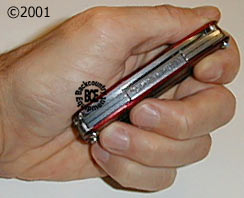 leatherman juice c2 inferno in hand, viewed from side